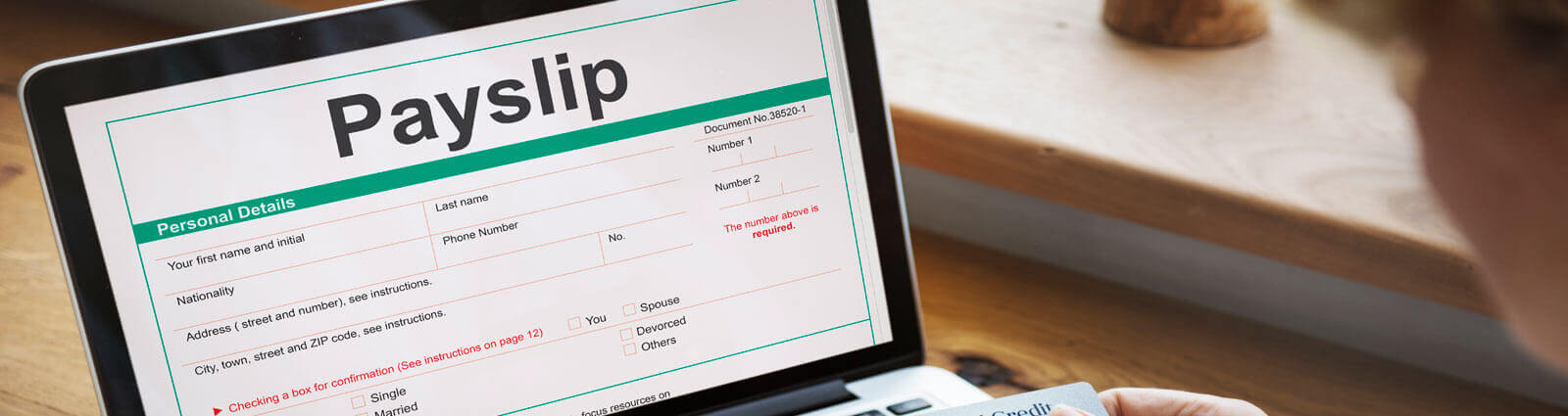 Payslip on a laptop screen